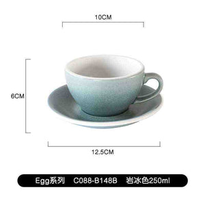 Loveramics Etoile Edition egg-shaped ceramic coffee cup with floral design and matching saucer