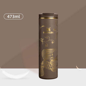 Stanley x NEST limited edition insulated travel bottles with artistic designs and cultural motifs