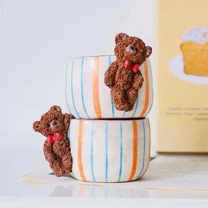 Hand-sculpted ceramic coffee cup Artisan Series with whimsical 3D animal and dancer designs