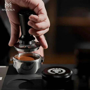 Glacier White Edition MUVNA precision manual coffee grinder with stainless steel burrs and ergonomic walnut handle.