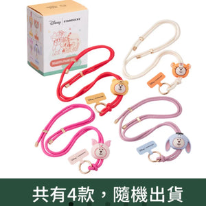 Winnie the Pooh lanyard accessories with plush attachments in packaging