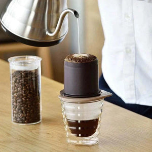 HARIO One-Cup Cafeor coffee brewer with eco-friendly stainless steel permanent filter on ceramic mug