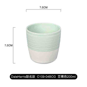 Modern ceramic handleless espresso cup with dual-textured finish by Loveramics