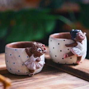 Yifang Artisan Collection whimsical 3D ceramic cups with hand-sculpted ballerina and mermaid designs