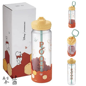 Winnie the Pooh cup with straw and lid closeup