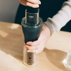 HARIO Smart G Electric Portable Coffee Grinder matte black with transparent dual containers and USB charging cable