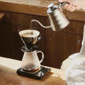 HARIO One-Cup Cafeor single-serve pour-over coffee maker with stainless steel mesh filter on a mug