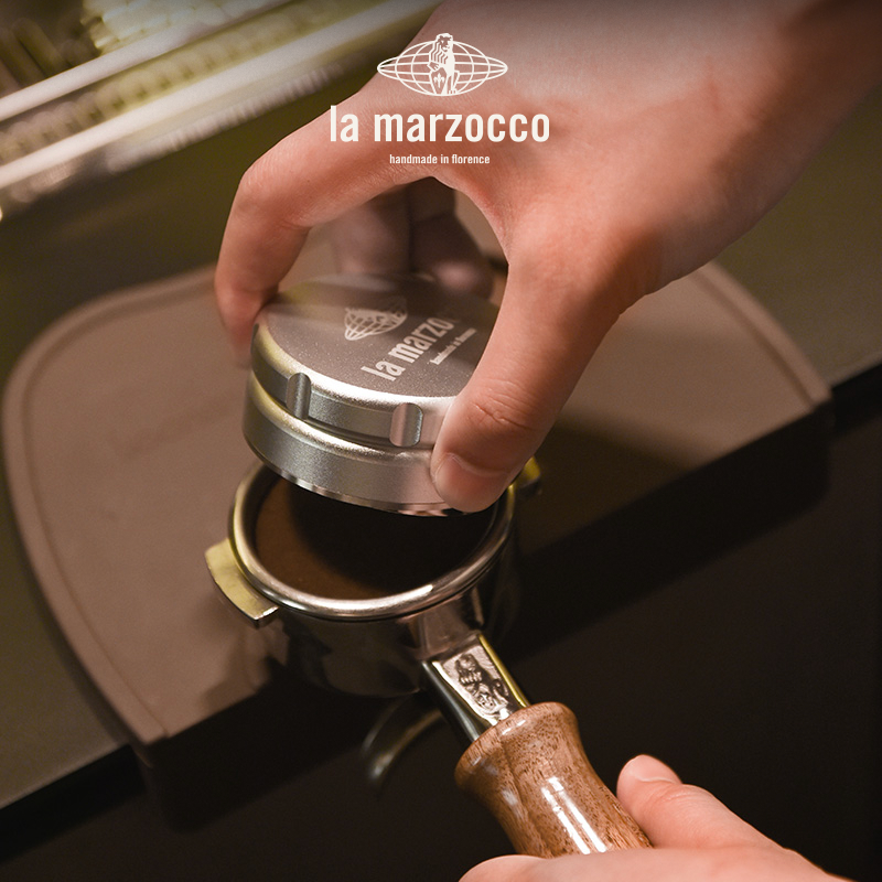 La Marzocco Precision Coffee Distributor espresso tool with ergonomic design for even coffee grounds distribution