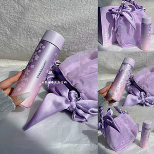 Starbucks cup from Purple Cherry Blossom Collection stainless steel drinkware with floral design and vacuum insulation