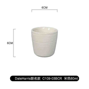 Modern ceramic handleless espresso cup with dual-texture finish by Loveramics