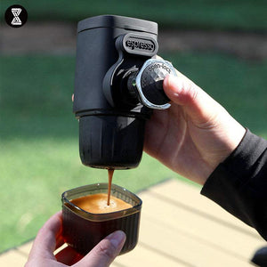 AeroPress Pro portable espresso maker with 15-bar pressure brewing capsule and ground coffee outdoors