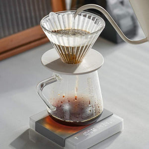 Mini Coffee Scale with Timer digital espresso scale on a white surface showing digital display