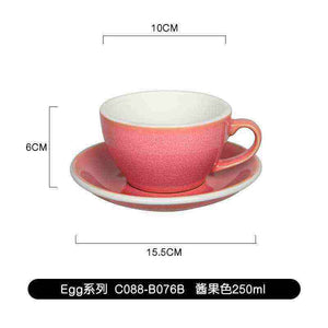 Loveramics Etoile egg-shaped ceramic coffee cup with floral design and matching saucer