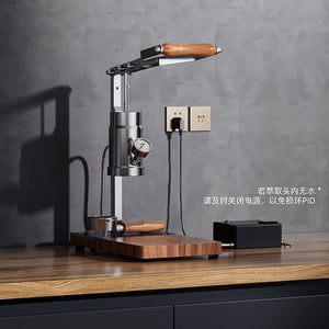 Aleman 2S Hand Press Espresso Machine with stainless steel body, wooden base, and lever for precision espresso extraction