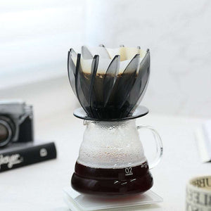 HARIO Water Lily V60 coffee dripper with petal design and smoky transparent finish on reinforced base