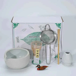 Japanese Maccha tea set with bowl, whisk, strainer, and accessories.