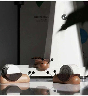 MUVNA Magnetic Tamper Wall Mount in matte black with espresso tamper attached, showcasing space-saving vertical storage and sleek design