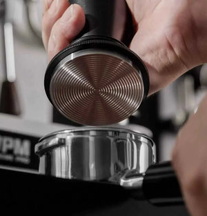 MUVNA Magnetic Dosing Funnel attached to a 58mm portafilter with magnetic wall mount for organized coffee grinding station