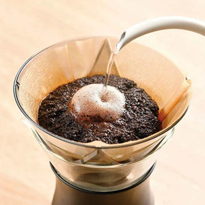 HARIO V60 Drip Decanter 400ml with removable smoke-grey dripper and black silicone band on a white background