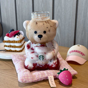 A full shot of the starbucks bear cup 2026 pink with its unique strawberry straw, presenting كوب ستاربكس الدبدوب الوردي 2026 آخر اصدار.