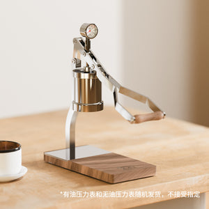 Aleman 2S Hand Press espresso machine with wooden base and stainless steel lever mechanism