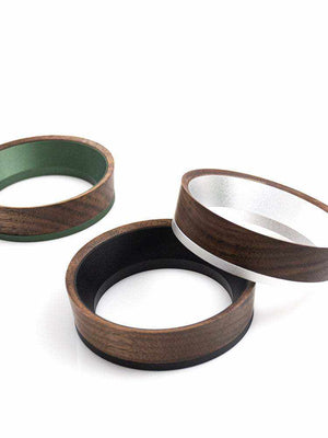 Magnetic espresso dosing funnel with walnut wood on portafilter