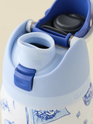 Owala Blue Cat insulated stainless steel water bottle with straw and cobalt blue feline design