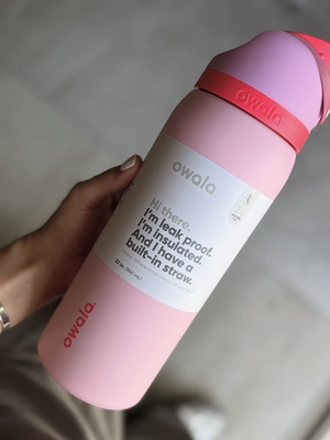 Pink Owala FreeSip insulated water bottle with straw and leak-proof lid