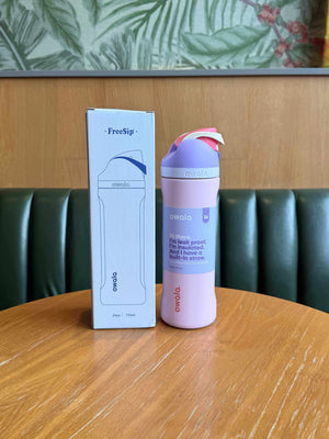 Owala FreeSip insulated stainless steel water bottle with dual-function lid and built-in straw