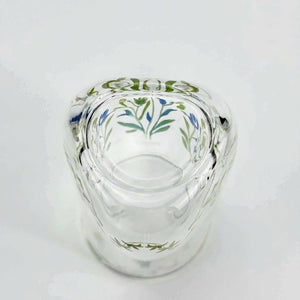 Starbucks glass tumbler with straw in the 2026 spring pattern design