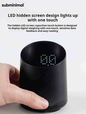Black subminimum digital coffee scale with LED display and touch control for precise coffee brewing