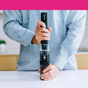 HARIO Smart G electric portable coffee grinder in matte black with transparent containers and one-touch operation