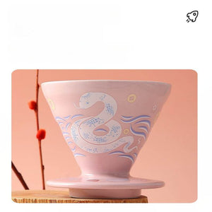 HARIO V60 2025 Lunar New Year ceramic coffee dripper with snake design in Blossom Pink and Imperial White colors
