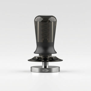 Close view of the IKAPE tamper ripple base in stainless steel