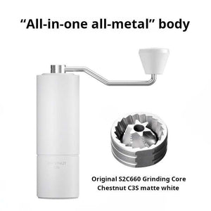Manual coffee grinder with stainless steel burr and ergonomic grip on a white background