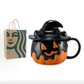 Starbucks halloween pumpkin cup with packaging bag, angled view