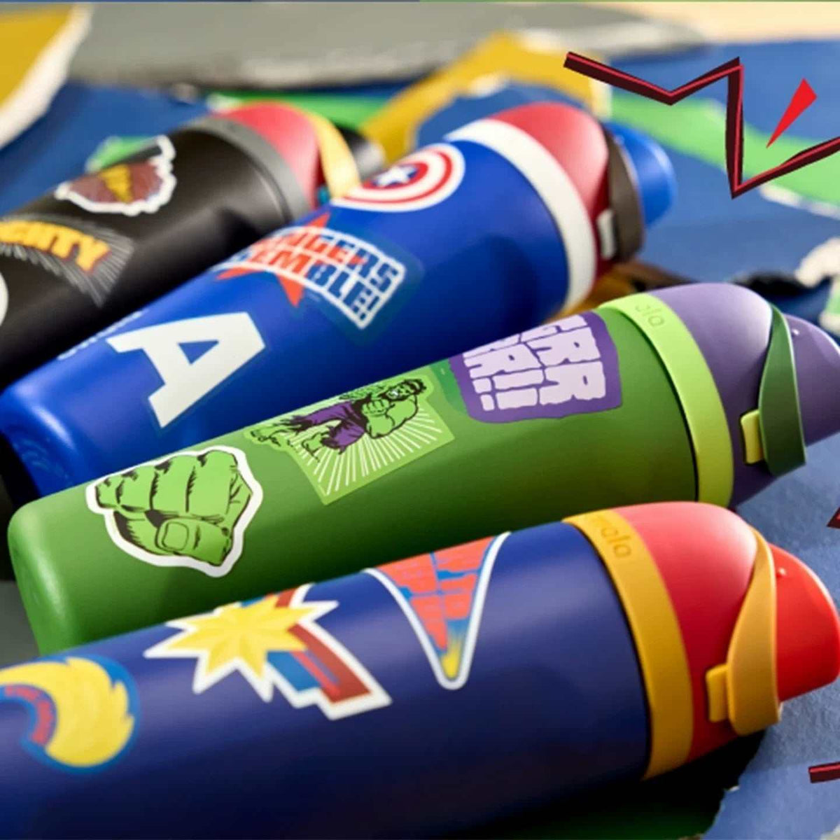 Owala 24oz FreeSip water bottle with Marvel superheroes design and carry loop