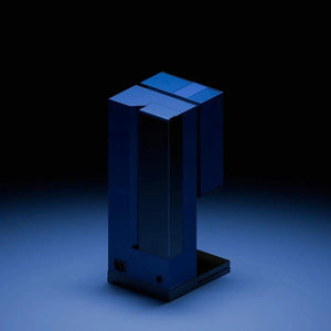 xBloom Studio pour-over coffee machine in blue, back three-quarter view in dark lighting