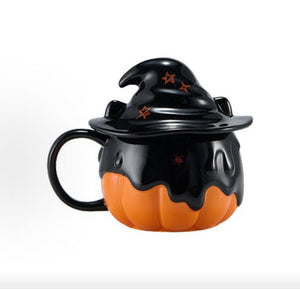 Starbucks halloween pumpkin cup side view showing dripping detail and stars on hat