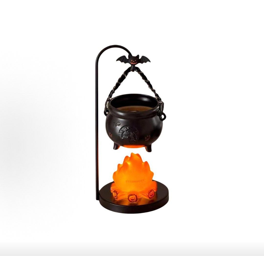 Halloween cauldron lamp with black metal stand and flame base