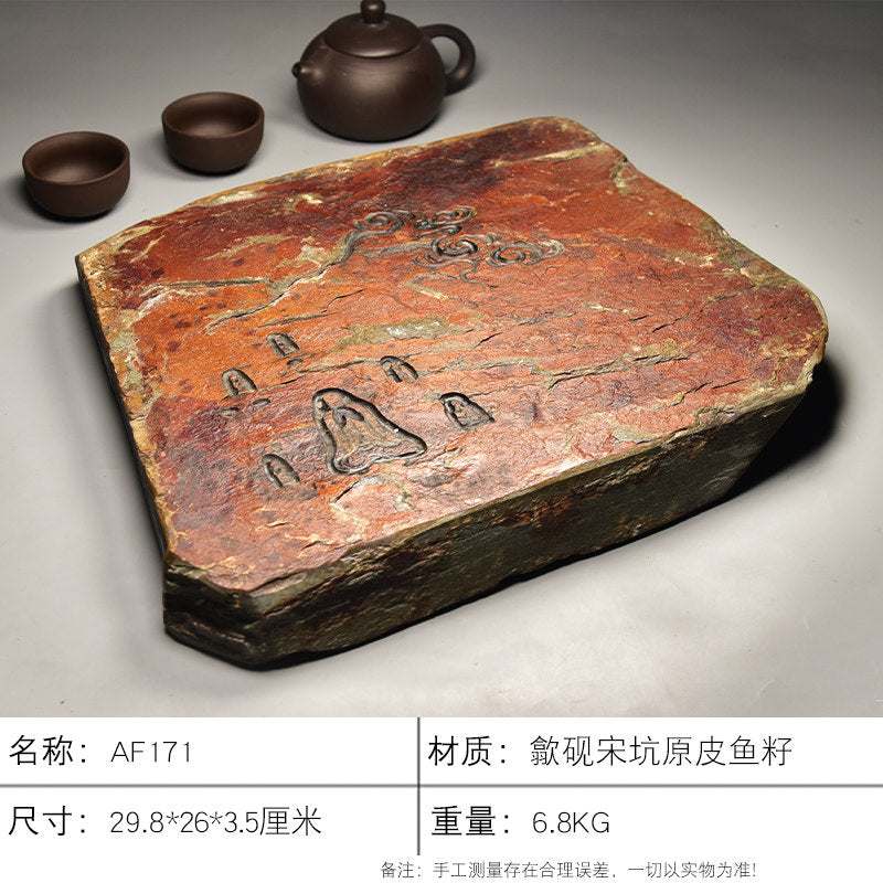 Handcrafted natural stone tea tray with traditional carvings for Gongfu tea ceremony