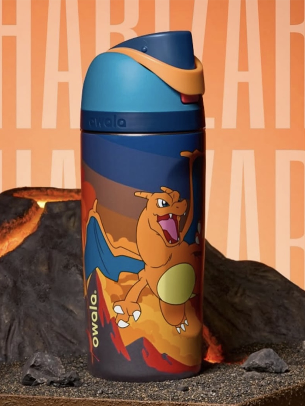 Owala Pikachu water bottle in orange and navy with character graphics, front view