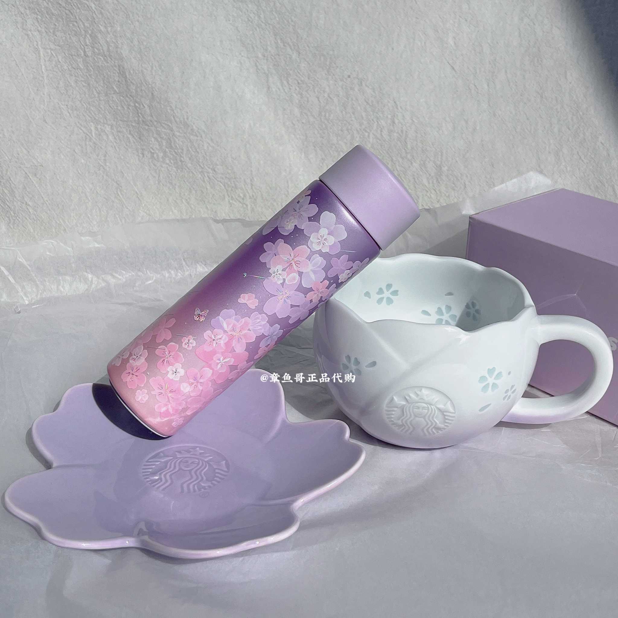 Starbucks cup from Purple Cherry Blossom Collection with floral design and stainless steel drinkware