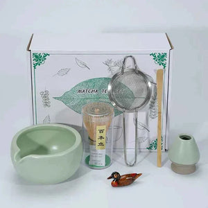 Japanese Maccha tea set with bowl, whisk, sifter, and accessories.