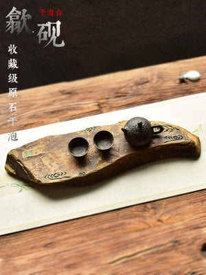 Handcrafted natural stone tea tray with carved traditional motifs for Gongfu tea ceremony