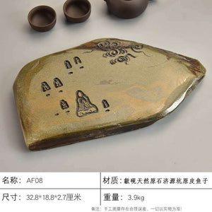 Handcrafted natural stone tea tray with traditional carvings for Gongfu tea ceremony