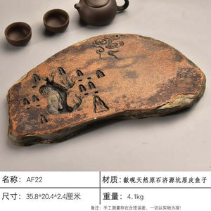 Handcrafted natural stone tea tray made from She Yan stone with traditional carvings for Gongfu tea ceremonies