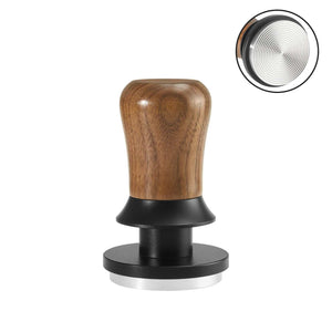 Espresso tamper with walnut wood handle and ripple stainless steel base for even extraction