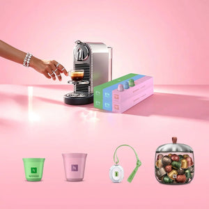 Nespresso Citiz Swarovski Edition promotional image with capsule being inserted into machine