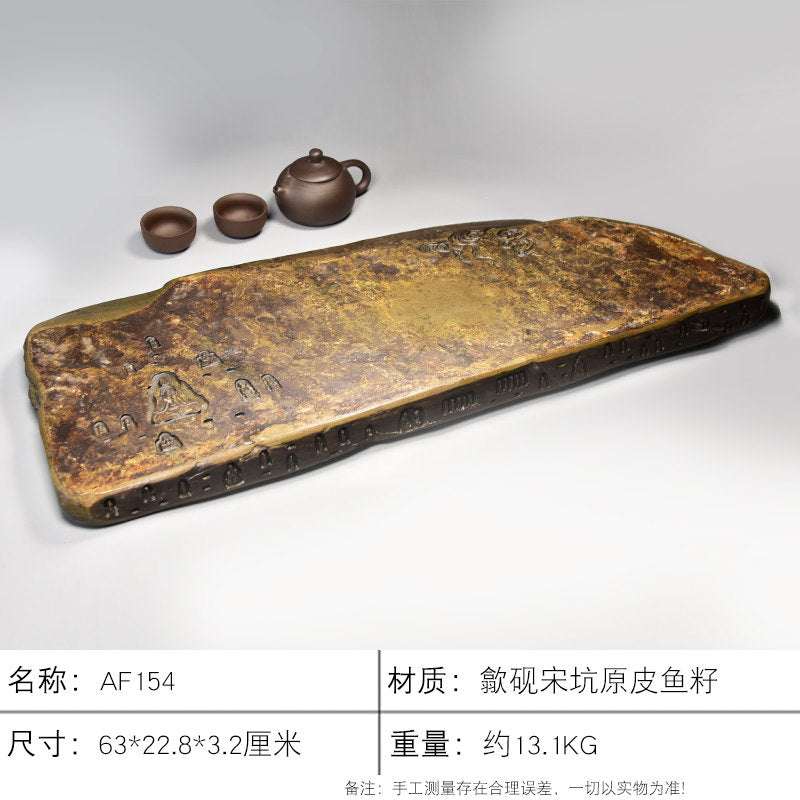 Handcrafted natural stone tea tray with traditional carvings for Gongfu tea ceremonies